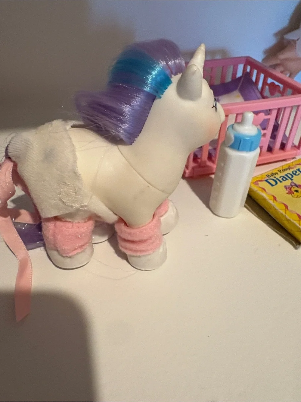 My Little Pony White Unicorn with Purple Mane and Pink Accessories. Baby. Crib.